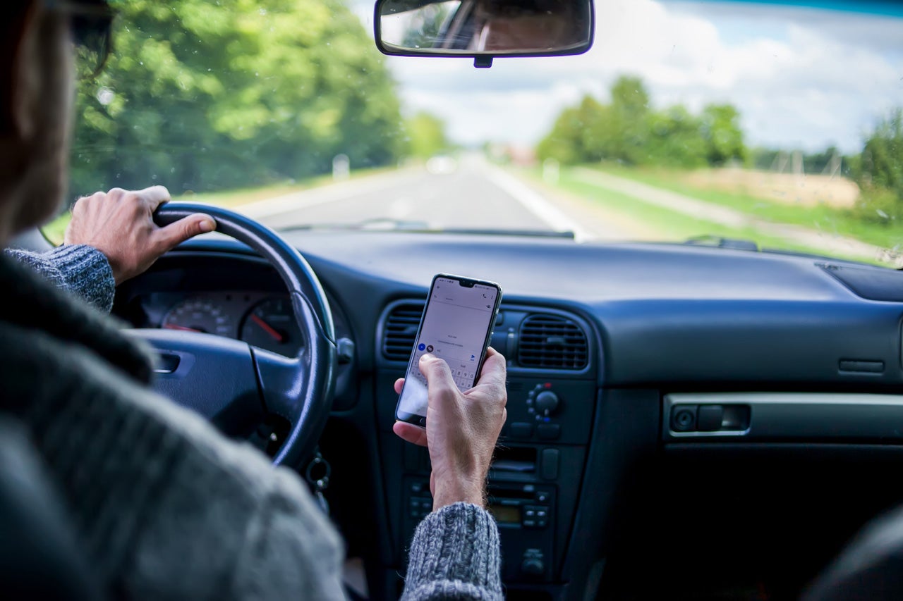 Can You Use Your Phone When Your Vehicle Is Stopped in Maryland?