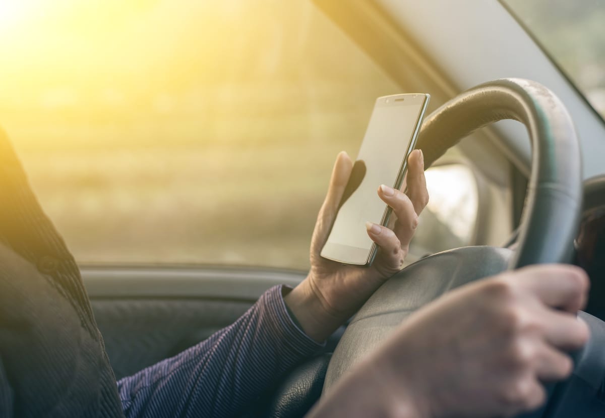 Can You Check Your Phone at a Red Light in Maryland?
